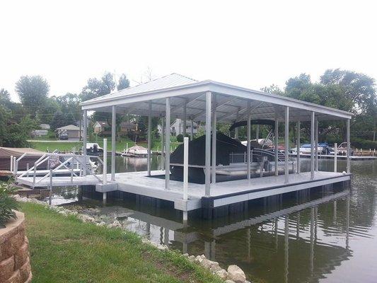 Floating boat house and pier