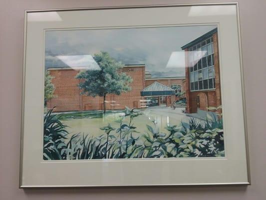 Beautiful watercolor of KOMS main entrance, hanging in main office.