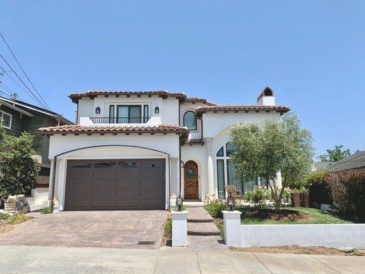 Outdoor balcony rail and over-the-garage trellis.  All custom designed and created.