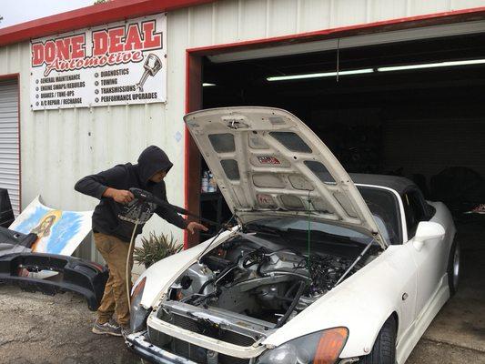 Power washing engine bay. We do offer wash and vacs. Let us know!