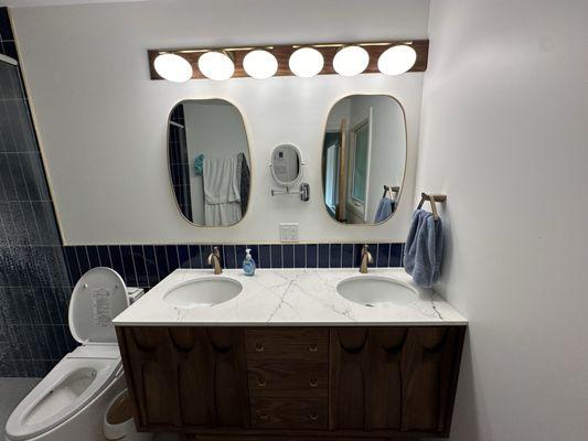 Counter top installed over vanity in bathroom