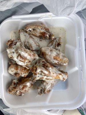 Garlic Parmesan Ranch and INSANE hot wings. Extra crispy as requested. In and out under 10 minutes.  Great flavor, worth the distance.