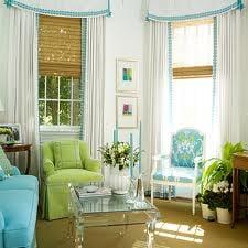 combine drapes with your woven woods for a finished look