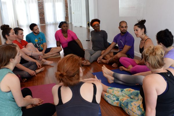 Our yoga training equips you with skills to practice and share trauma-sensitive yoga. teachertraining@yogadistrict.com