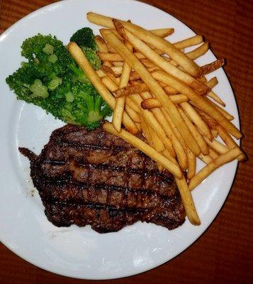 Grass fed rib eye with fries and broccolini... but they brought out broccoli