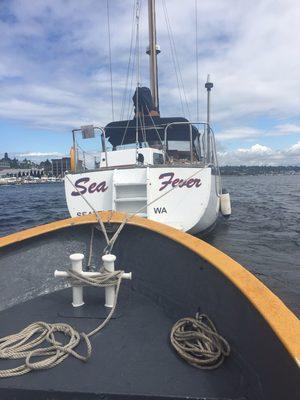 Tug Halftrack assisting sailboat on Lake Union