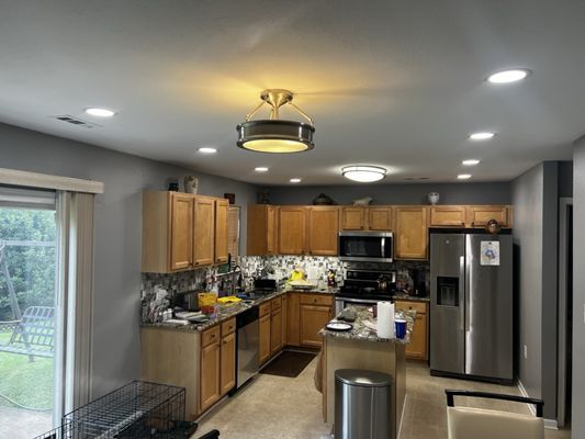 8 canned lights installed in the kitchen.