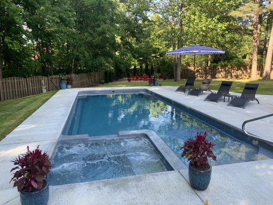 Backyard pool serviced by Rocket City Pools and Spa.