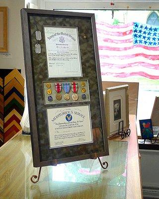 We are always proud to serve those who have served, and we are experts at mounting and framing military regalia.