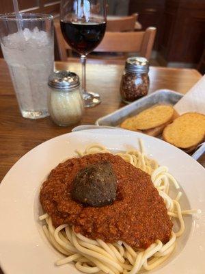 Pasta Al dante' In a meat sauce with one meatball . Pinot noirs. Perfect match!