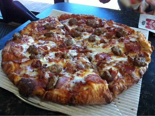 Meat Supremo - cheese, classic pepperoni, Italian sausage, ham, bacon with extra cheese