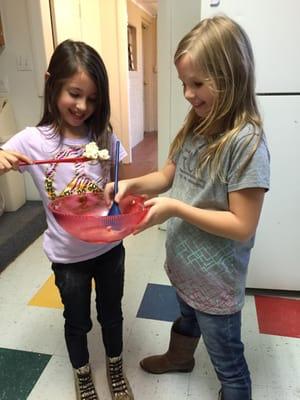 Making hush puppies with a friend.