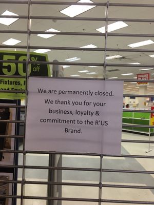 Sign on front of store.