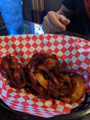 This is the pile of burnt onion rings I got.