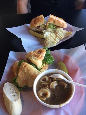 Curry chicken croissant sandwich with vegetable beef soup. And San Franscian and chips.