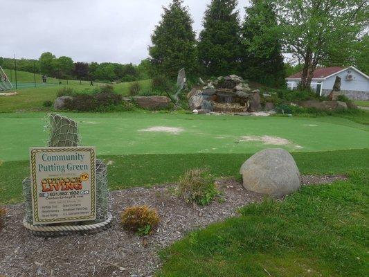 My favorite bench overlooks the Community Putting Green which features a waterfall.