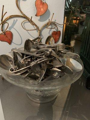 Kind collection of spoons bended with the mind