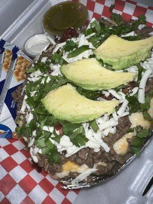 Loaded Baked potato, butter, cheese, fajita. Queso fresco, cilantro & avocado.