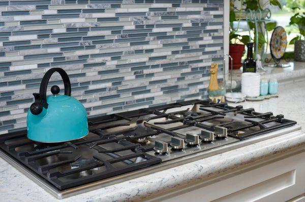 Close up of the tile backsplash and new cooking range.