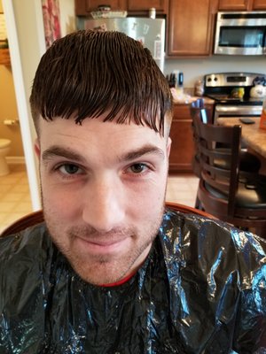 My husband's haircut that he received from Sport Clips Haircuts of Greenwood Springs. This was taken just BEFORE we fixed it at home.