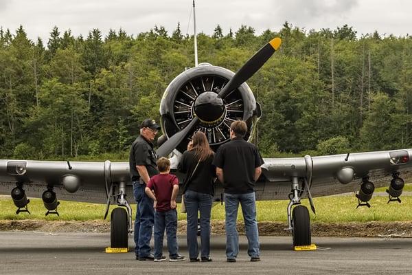 Visitors learn about the T6 "Texan" - one of many flyable aircraft in the collection.