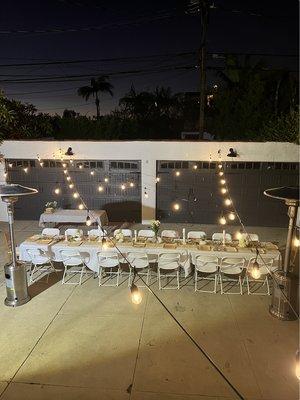 2 heat lamps, 3 tables and folding chairs for my backyard dinner party!