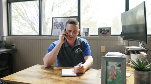 HQ Water Solutions taking a phone call regarding water quality issues in a customer's home.