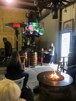 Get comfortable and relax with our fire pits and big screens!