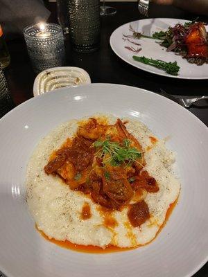 Gamberetto & grits - sautéed shrimp, Calabrian chili-garlic sauce, roasted tomatoes, over goat cheese heirloom polenta