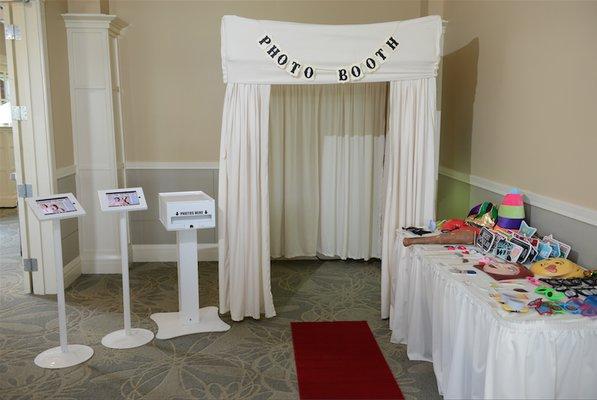 Enclosed format photo booth with social media station for instant sharing, high resolution printer and loads of fun props!