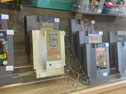 Zelda and other assorted Nintendo Entertainment System video game cartridges.