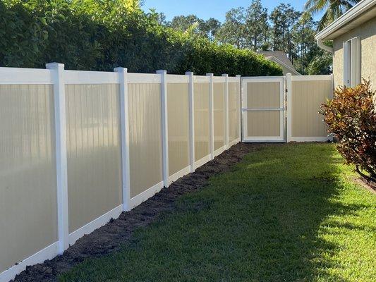 Our Side yard with gate.  Perfectly straight and beautiful.