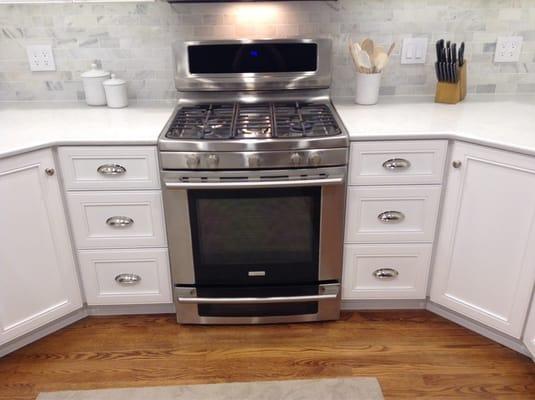 Tony also thought we should balance our stove by having two sets of drawers on either side.  Love it!