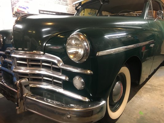 Here's that same NOS 1949 Dodge fender completely refinished, several man hours later.