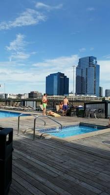 Rooftop patio with pool and hot tub