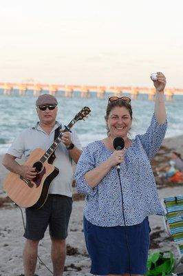 Our Spiritual Leader, Cantor Danielle Bensimhon leading Beach Shabbat.