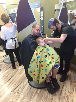 Our stylist working his magic with my toddler