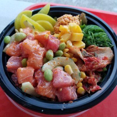 Small bowl. 2 protein (tuna, salmon) 2 sides (seaweed salad, spicy crab). Yum! Filling and only $9