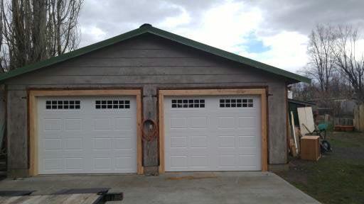 Replaced old barn style doors with Amarr Lincoln 3000