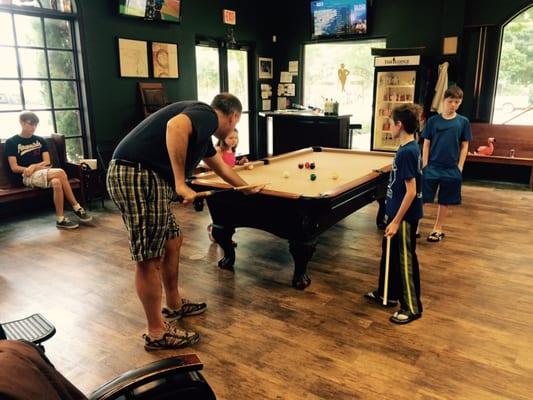 Father and son pool game