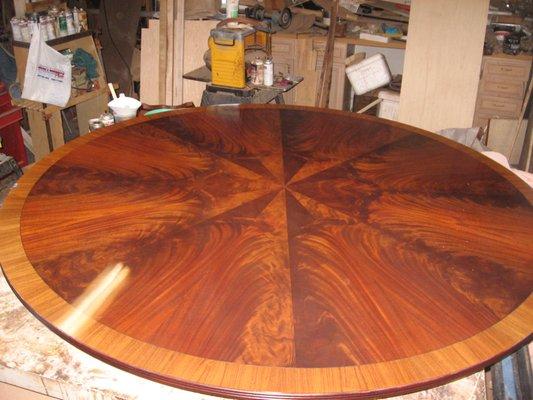 72" round table, refinished and  hand polished to a high gloss