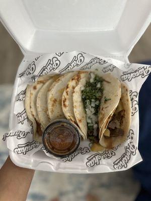 Barbacoa, guisado and queso con chile tacos