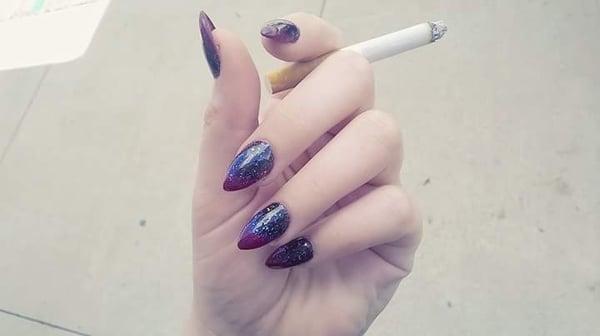 Galaxy stiletto nails. Done by annalise