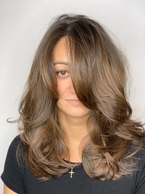 Layered haircut with a straight foundation to give a solid base but with movement.