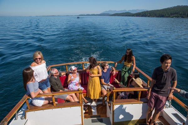 The "Mustang" is a beautiful throwback to the era of wooden speed boats and the perfect place to host family and friends on Flathead Lake.