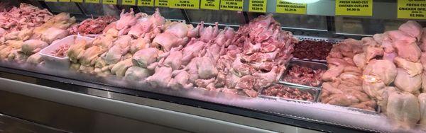 Full selection of whole chickens and chicken parts.