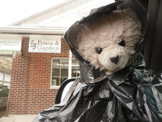 Tristan made his own rain slicker from a black trash bag and clear packing tape.