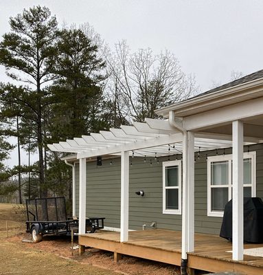 Patio addition with pergola.