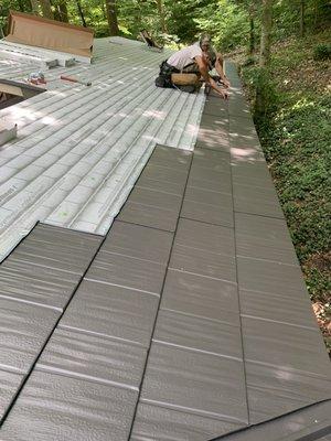 Installation of new metal shingle roof