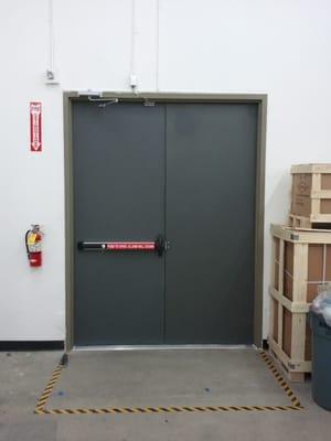 Hollow metal doors with specified hardware